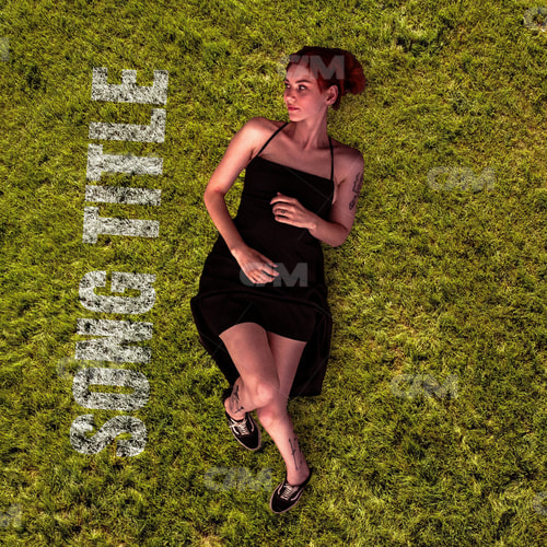 Girl Lying On Grass