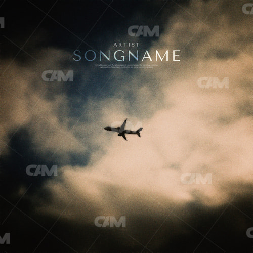 Plane In The Clouds